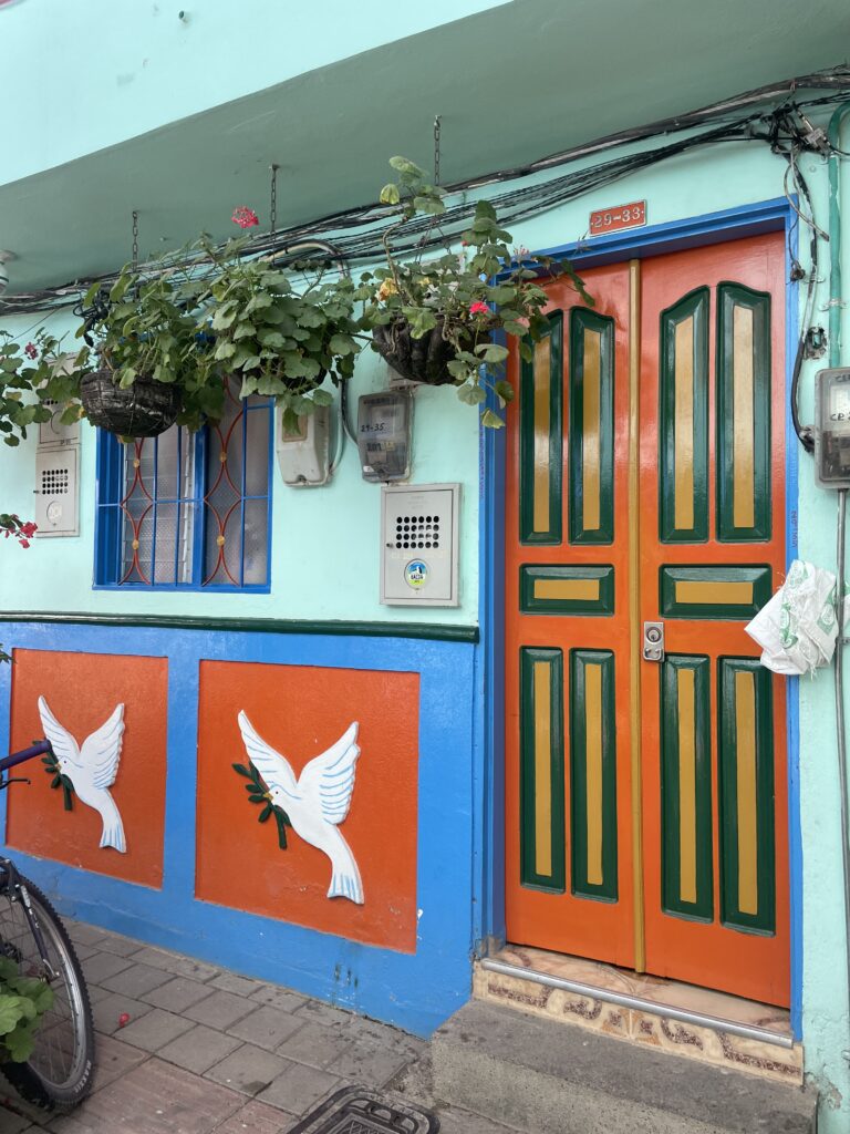 classic colombian style colourful buildings in guatape, medellin (2)