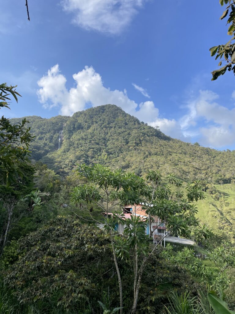 hike mountain views on the way to charco del amor waterfall cocorna antioquia colombia